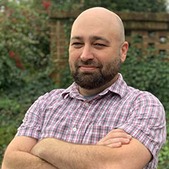 Headshot of H. Adam Lenz